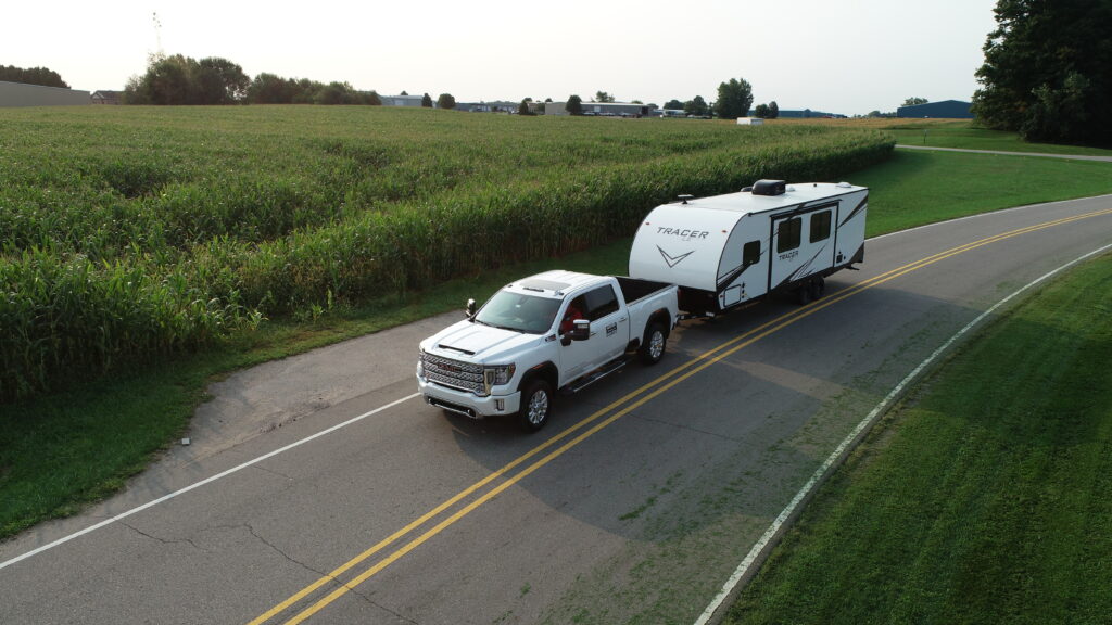 pickup truck hauling a single rv towable unit