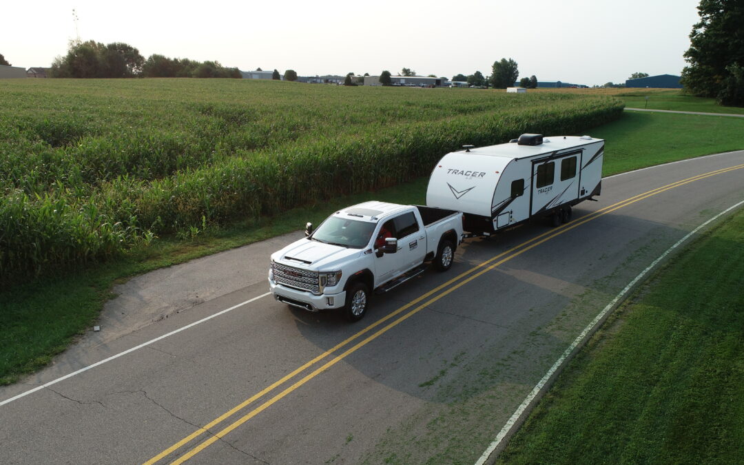 pickup truck hauling a single rv towable unit